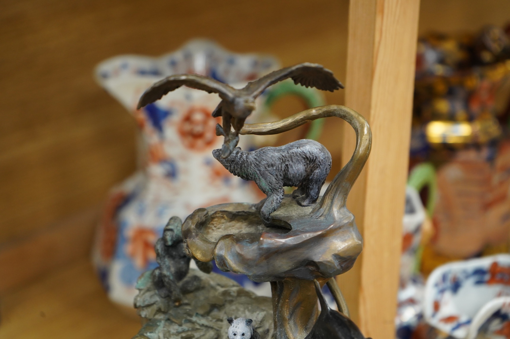 A Franklin Mint, decorative cast metal animal rockery, limited edition 1058/9500, 39cm high